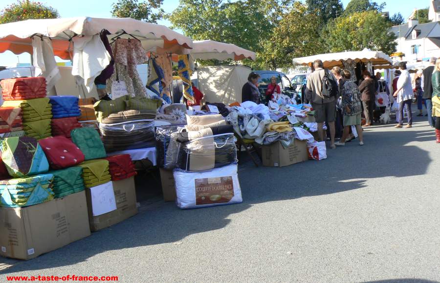 Fruit Stall With People Buying At Morlaix Weekly Market France