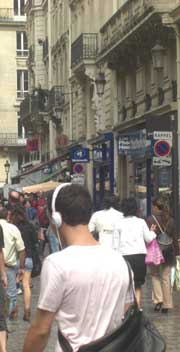 Paris people walking busy street