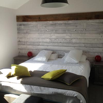 double bedroom with feature wallpaper