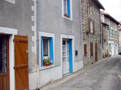 Front of house (blue shutters)