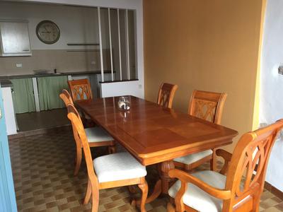 Kitchen & dining room with exposed stone walls