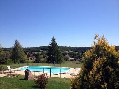 the swimming-pool with the view over the village