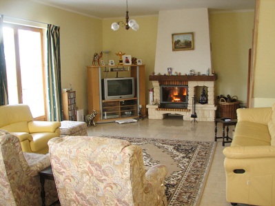 lounge with log burning fire insert