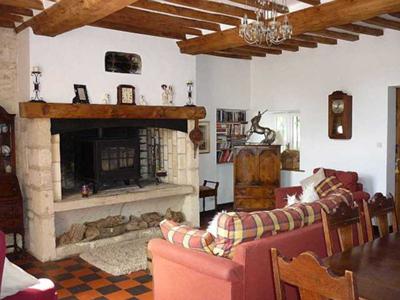 Lounge with character beams and wood burner