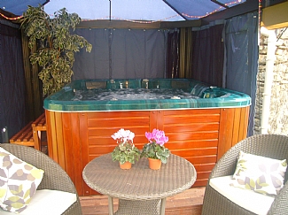 Sheltered hot tub for your exclusive use
