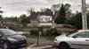 Actual street view — the existing house behind the plots is not included in the sale.