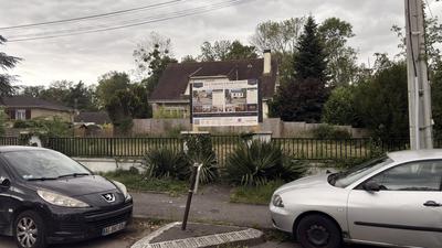 Actual street view — the existing house behind the plots is not included in the sale.